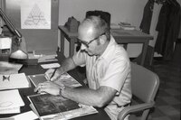 1975 Soil scientist Mel_Brown  looks at aerial photos