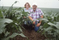 Linda and Dana Sitzmann pose in the newly constructed terrace in the field.