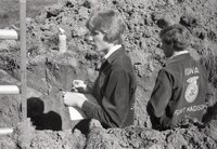 1970s FFA students work on a project around a ditch