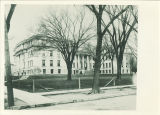 Hall of Liberal Arts with adjacent wooden sidewalk, The University of Iowa, 1900s