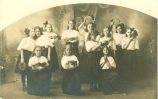 Dancing girls in various poses, Roland, Iowa, 1910s