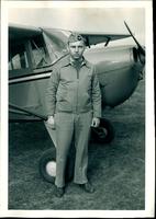 0040_Earl Pohlmann in Front of Plane