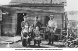 Mrs. Arnold and children with Snyder on Payne and Arnolds Ranch, Minnekahta, S.D., late 1890s or early 1900s