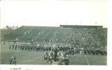 Marching band and Scottish Highlanders performance at Chicago-Iowa football game, The University of Iowa, October 15, 1938