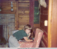 John, Jr. talking on the phone
