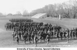 Inspection on Iowa Field, rifle signal shot from rear of formation, The University of Iowa, April 4, 1918