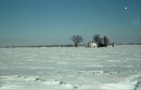 farmhouse in snow