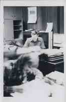 Man Sitting at Desk 