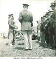Awards presentation with civilians and soldiers, The University of Iowa, 1950s