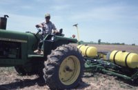 Photograph Collection Of A Man On A Tractor 