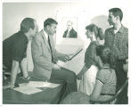 Paul Engle with Writers' Workshop students, The University of Iowa, 1950s