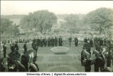 Convocation with University officials and band at the west steps of Old Capitol, The University of Iowa, 1930s