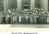 Class photo at west portico of Old Capitol, The University of Iowa, 1920s