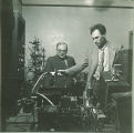 Glocker and Roberts working with laboratory equipment, The University of Iowa, 1950s