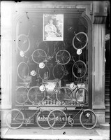 BI 213  Mauro and Wilson bookstore window with bikes