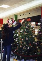 2002  Volunteers Rachel and Maureen Fosdick decorate Christmas tree