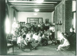 Women gathered in lounge in Currier Hall, The University of Iowa, 1916