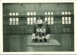 Gymnasts building a human pyramid, The University of Iowa, 1927