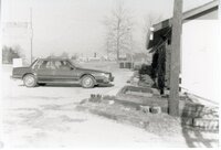 Unidentified car parked in front of Plant Materials Center