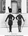 ROTC band conductors standing next to Old Capitol, The University of Iowa, 1930