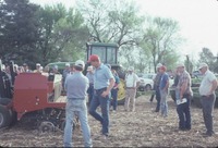 Group looking at farm machinery