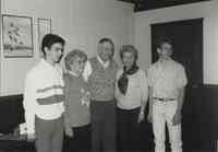 Office Photo with a man, two teenage boys  and Two Women Standing