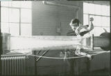Researcher with equipment, 1976