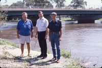 Cherokee County flood committee members meet at the river side to talk about flood control. 