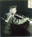 Boy playing with boxes, The University of Iowa, 1920s