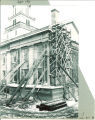 Scaffolding and support beams against the Old Capitol during reconstruction, The University of Iowa, September 1921
