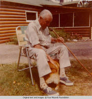 Bill Burden petting dog