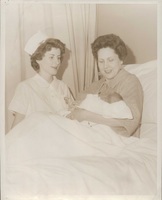Nurse, baby and mother.