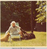 Elizabeth Burden petting Mollie and Sadie
