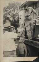Receiving fish to stock farm ponds.