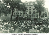 Commencement on the Pentacrest with Macbride Hall in background, The University of Iowa, 1930s