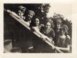 Six women from the library staff pose for a photograph