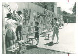 School children painting wall mural, The University of Iowa elementary school, 1960