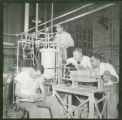 Making filtration tests, 1953
