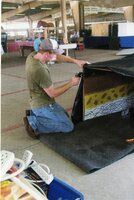 2010  Fair Booth worker Caleb Walters Sets Up Display Booth
