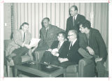 Paul Engle, left, gathered with prominent authors and editors for literary symposium, The University of Iowa, December 4, 1959