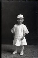 Toddler in white hat