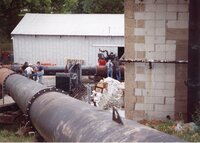 1993 Flood water being piped into the Iowa River