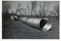 Four Men Install Underground Pipes
