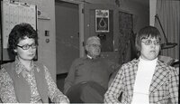 1976 Commissioners sit at a meeting