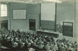 Students in a large chemistry lecture, The University of Iowa, 1930s