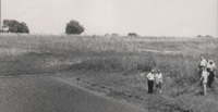 Group of Men Examine Howard Elder's Farm.