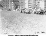 Governor's Day ceremony, VIPs sitting next to awards table, The University of Iowa, 1931