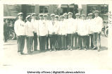 Students in white caps and jackets for Senior Frolic, The University of Iowa, 1910s