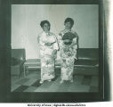 Foreign students wearing kimonos at a multi-cultural party, 1960s