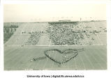 Marching band performing at football game, The University of Iowa, October 7, 1939